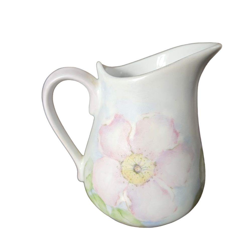 Beautiful handpainted floral creamer.